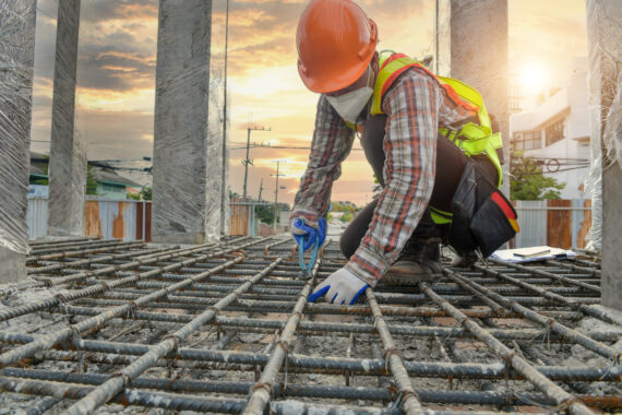 Worker with contruction iron lines for building foundation,Construction Worker